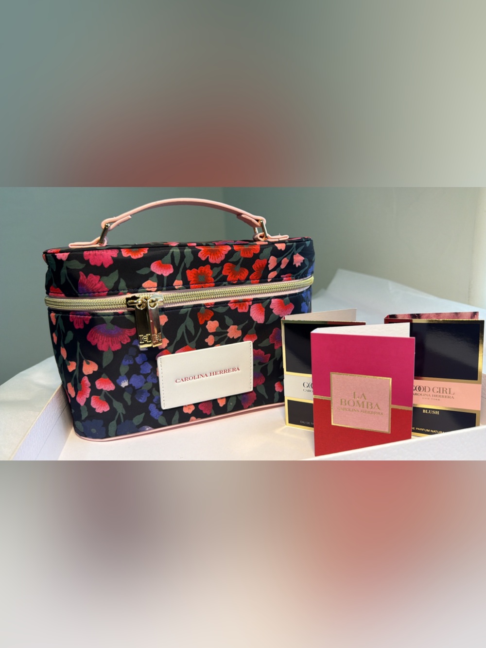 New, unused Carolina Herrera Black Floral Cosmetic Case limited edition